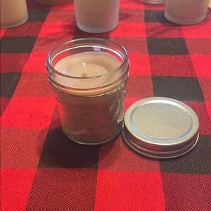 Scented Beige Candle in Glass Jar. Chocolate scented.